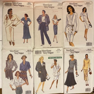 May include: Six sewing pattern envelopes featuring a variety of designs for women's clothing. The patterns are from the Very Easy Very Vogue brand and include a range of styles, such as dresses, skirts, tops, and jackets. The envelopes are white with a blue and red design and showcase a model wearing each garment.