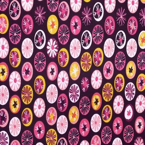 May include: Purple fabric with a repeating pattern of pink, yellow, and white circles with floral designs.