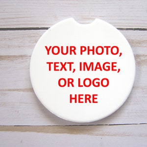 May include: White round coaster with the text "YOUR PHOTO, TEXT, IMAGE, OR LOGO HERE" in red.