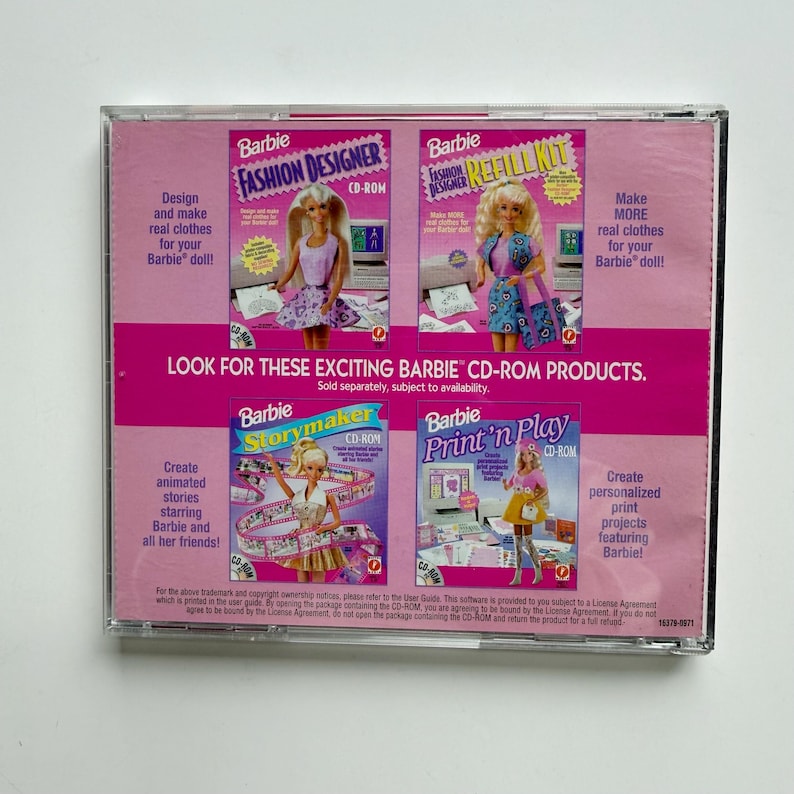 May include: A pink Barbie CD-ROM software case back cover featuring four game titles: Fashion Designer, Fashion Designer Refill Kit, Storymaker, and Print 'n Play. The text includes product descriptions and the phrase Look for these exciting Barbie CD-ROM products.