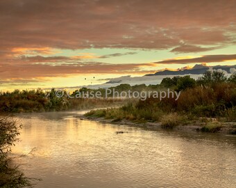 River Bend Dawn is a photo of the Rio Grande River at sunrise with hot air balloons in the distance
