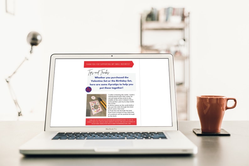 May include: A laptop screen displaying a webpage with the text "Tips and Tricks" and instructions on how to assemble a Valentine's Day or Birthday craft kit. The text says "Whether you purchased the Valentine Set or the Birthday Set, here are some #pratips to help you put these together!"