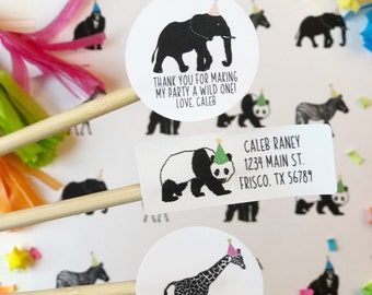 May include: A set of party favor stickers featuring various animals wearing party hats. The stickers include a panda, giraffe, elephant, and zebra. The stickers are printed on white circular labels with black outlines. The text on the stickers reads "Thank you for making my party a wild one! Love, Caleb" and "Caleb Raney, 1234 Main St., Frisco, TX 56789".