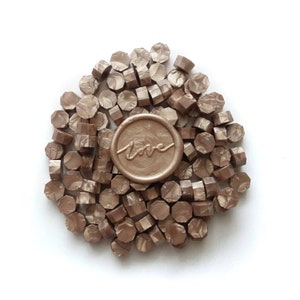 Champagne 100 stuks zegellakkorrels kralen pellets tabletten