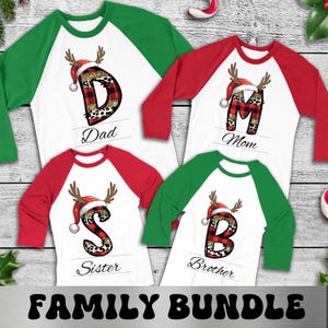 May include: Four white raglan shirts with red and green sleeves. Each shirt has a letter, a Santa hat, and antlers. The shirts read "Dad", "Mom", "Sister", and "Brother". The text "FAMILY BUNDLE" is at the bottom.