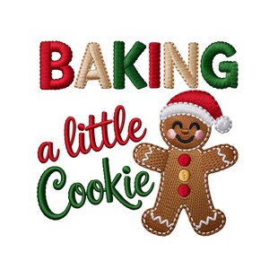 May include: Embroidered design with the words "BAKING a little Cookie" in red, green, and tan thread. A gingerbread man wearing a Santa hat is smiling. The design is on a white background.