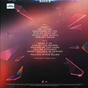 May include: Back cover of a vinyl record with a pink, blue, and purple geometric design. The record features songs by "Angry", "Get Close", "Depending On You", "Bite My Head Off", "Whole Wide World", "Dreamy Skies", "Mess It Up", "Live By The Sword", "Driving Me Too Hard", "Tell Me Straight", "Sweet Sounds Of Heaven", "Rolling Stone Blues".