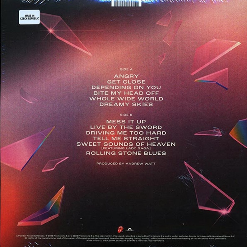 May include: Back cover of a vinyl record with a pink, blue, and purple geometric design. The record features songs by "Angry", "Get Close", "Depending On You", "Bite My Head Off", "Whole Wide World", "Dreamy Skies", "Mess It Up", "Live By The Sword", "Driving Me Too Hard", "Tell Me Straight", "Sweet Sounds Of Heaven", "Rolling Stone Blues".