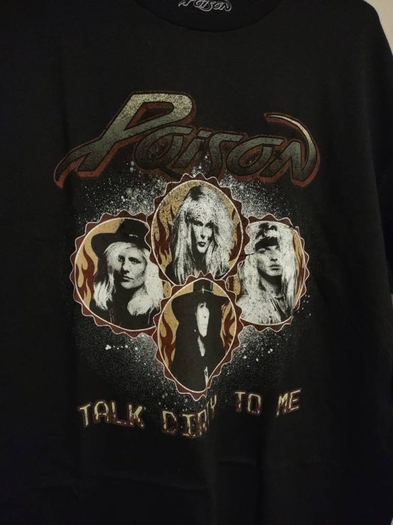 May include: Black t-shirt with a vintage-style graphic of the band Poison. The graphic features the band's name in a stylized font and images of the band members. The text "Talk Dirty To Me" is printed below the graphic.
