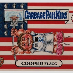 May include: A Garbage Pail Kids trading card featuring a cartoon basketball player with the text "DALLAS 32" on his jersey. The background is an American flag with the text "GARBAGE PAIL KIDS" and the name "COOPER FLAGG".