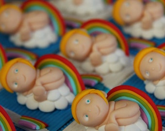 Cajas dragadas ángel en sus nubes y arco iris