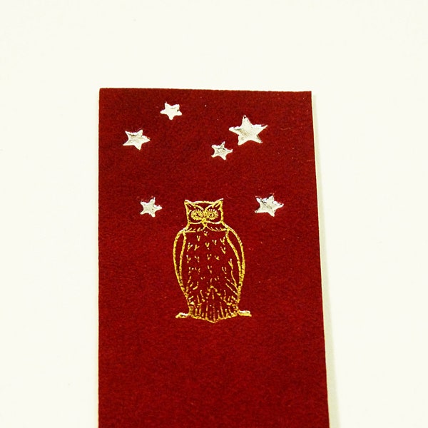 burgundy leather page brand with owl and stars