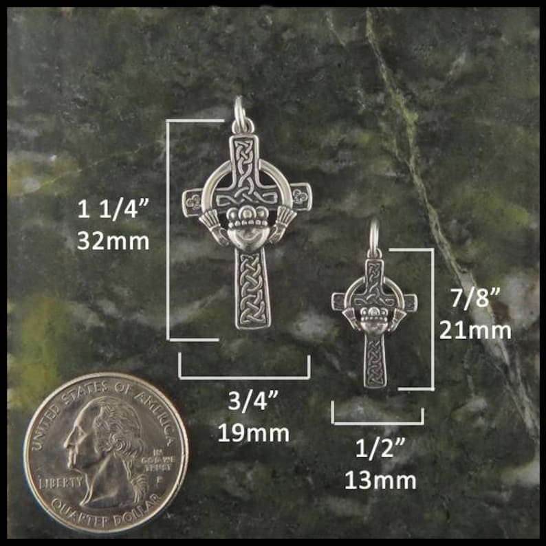 May include: Two silver Celtic knot cross pendants with a shamrock design. The larger pendant measures 1 1/4 inches and the smaller pendant measures 7/8 inches.