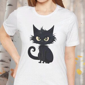 Black Cat Green Eyes Shirt | Halloween Feline Top | Gothic Kitty Tee | Unique Halloween Tee | Unisex- Men & Woman&#39;s Jersey Short Sleeve Tee