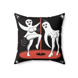 May include: A black throw pillow with a white design of two ghosts dancing around a red pole. The ghosts have white eyes and mouths.