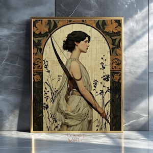 May include: A framed art print featuring a classical illustration of a woman with a bow and arrow. The artwork has a gold frame and a beige background with floral and geometric patterns. The woman is dressed in a draped gown.