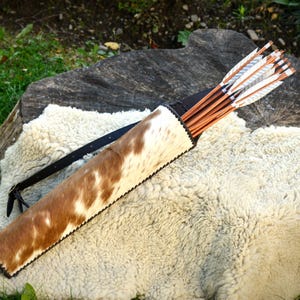 Semicircular, laced back quiver - hair on leather