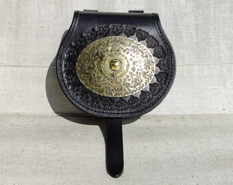 Leather belt purse with middle east inspired brass disc