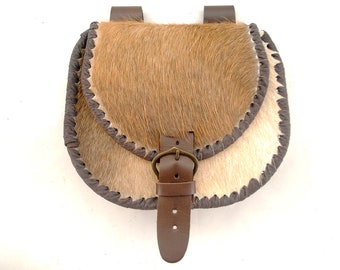 Medieval hair-on-leather belt bag with laced edges