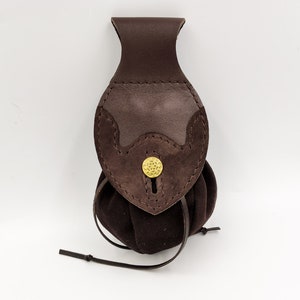 Belt-fastened pouch with flap and brass button image 1