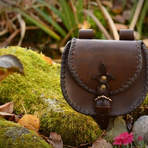 Medieval belt bag with laced edges