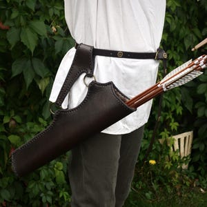 Leather side quiver with brass rings