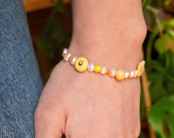 Smiley Amarillo, pulsera con charms personalizados Gato Naranja, Smiley, Hoja de Planta, cuentas de colores y perlas de río