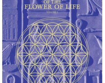 May include: A book cover with a blue background and a yellow geometric pattern in the center. The title is "The Ancient Secret of the Flower of Life, Volume I" by Drunvalo Melchizedek.