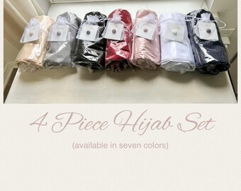 May include: A set of seven 4-piece hijab sets in various colors, including beige, gray, black, red, pink, white, and navy blue. Each set is packaged in a clear plastic bag with a small tag.
