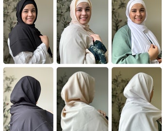 4 piece Hijab Set. Includes hijab, magnet, undercap, and scrunchie.