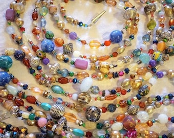 Unieke kerstboomslinger, handgemaakte geüpcycled vintage kostuumsieraden