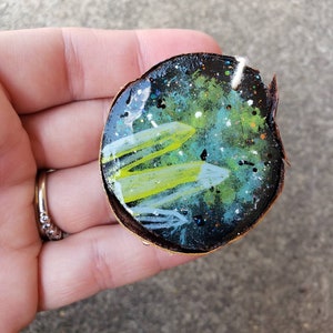 Handmade Wooden Slice Ornament. Crystals. Green and blue. Handpainted. Galaxy. Resin glitter