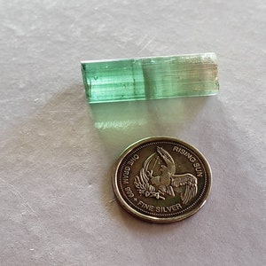 Bi color Nigerian Tourmaline crystal. Pink and green colors. 2.8gram 22mm x 9mm. Tourmaline specimen. Jewelry making, collectable.