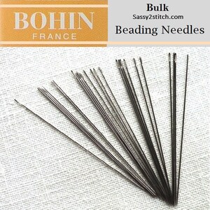 May include: Bulk pack of Bohin beading needles, a French brand, on a white fabric background. Sassy2stitch.com is printed on the label.