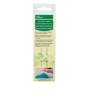 May include: A package of Clover Snag Repair Needles. The package is green and white with a clover leaf design. The text on the package reads "Snag Repair Needles" in English, French, Spanish, and German. The package also includes a picture of a hand using the needles to repair a snag in a piece of fabric.
