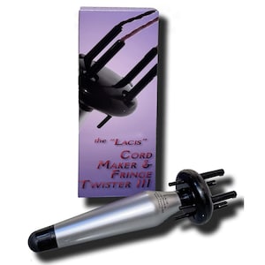 May include: A silver and black cord maker and fringe twister tool. The box and tool feature the text "the 'LACIS' CORD MAKER & FRINGE TWISTER III". The tool has multiple black prongs and a black tip.