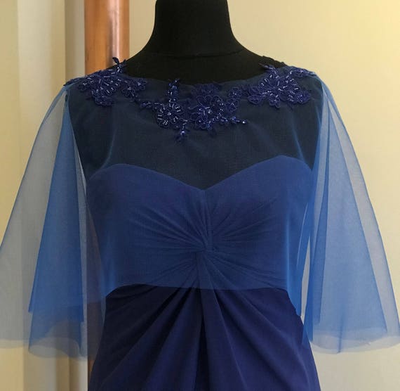 royal blue dress with cape
