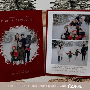 May include: Two rectangular holiday greeting cards with a deep red background. The left card features a white wreath graphic framing a family photo and the text merry christmas and the Jackson family. The right card displays two photos and the text we wish you a happy holiday season and a happy new year 2027 with the names Jackson, Monica, and Amea.