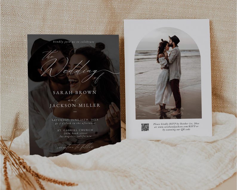 May include: Wedding invitation with a black and white photo of a couple on the front. The text reads "The Wedding of Sarah Brown and Jackson Miller" with the date and location of the wedding below. The back of the invitation has a photo of the couple on a beach with a QR code for RSVP.