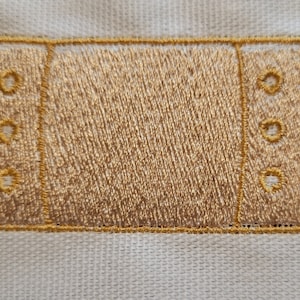 Einfaches Bandaid Maschinenstickerei Design