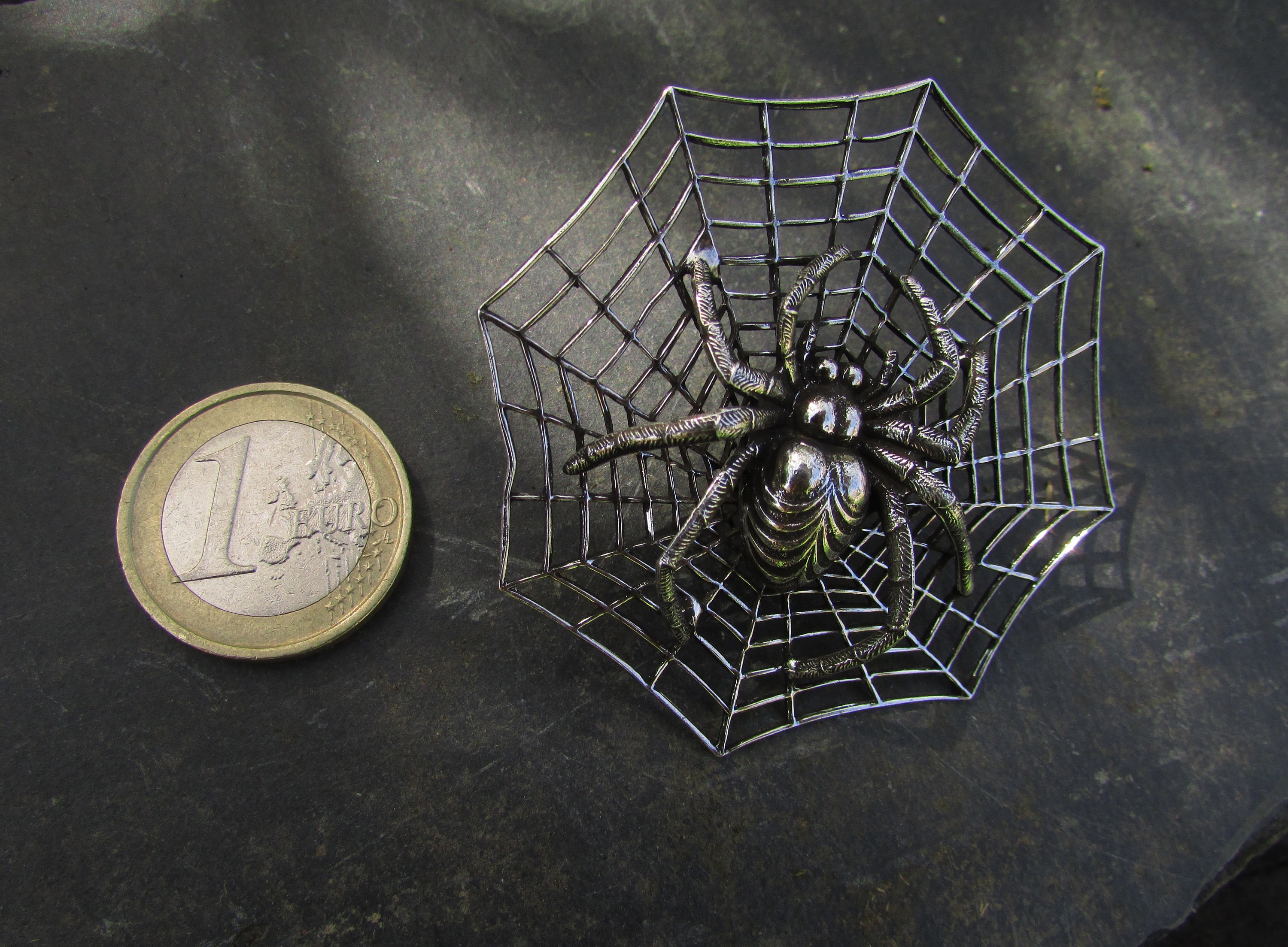 Spider web best sale brooch