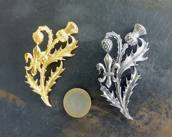 Duża broszka z ostem i fleur-de-lys, broszka z ostem w stylu secesyjnym, symbol szkockiej rodziny królewskiej