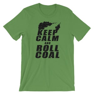 May include: Green short-sleeved t-shirt with black text that reads "Keep Calm and Roll Coal". The text is stylized with a distressed look. A black silhouette of a train engine with smoke is above the text.