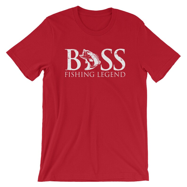 May include: Red short-sleeved t-shirt with a white graphic of a bass fish and the text "BASS FISHING LEGEND".