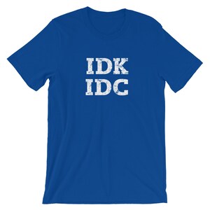 May include: A royal blue t-shirt with the text "IDK IDC" in white distressed lettering.