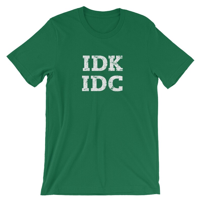 May include: A green t-shirt with the text "IDK IDC" in white distressed lettering.