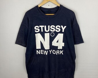 STUSSY CUSTOMADE N°4 Tシャツ STUSSY×CUSTOMADE】USA製カスタメイド NO.4 黒Tシャツ - メルカリ