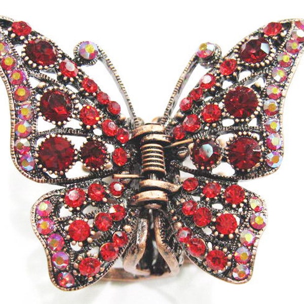 Pince métal avec strass en forme de papillon