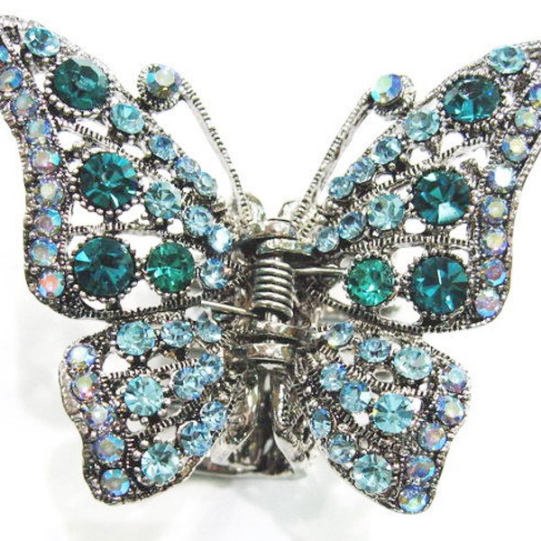 Pince métal avec strass en forme de papillon