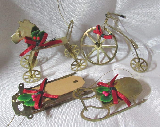 Set of 4 Vtg 1980's Brass Christmas Ornaments - - Penny Farthing, Wheeled Horse,Sled w/Wood and Small sled (s1)